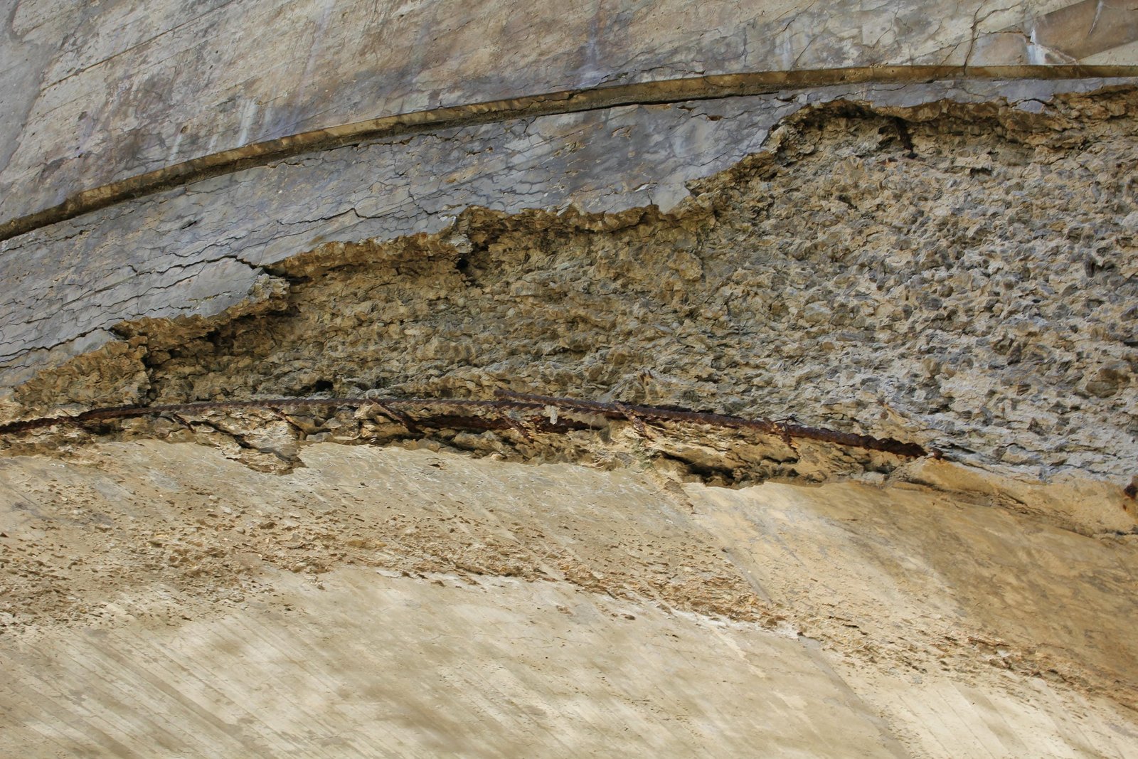 Severe spalling at arch line